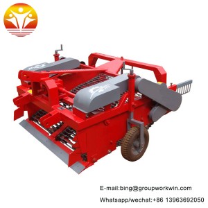 Hold the potato harvester by hand